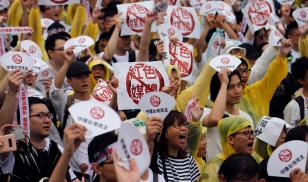 BGMI: Protesters in Taiwan hold placards with messages that read “reject red media” and “safeguard the nation’s democracy” during a rally against pro-China media.