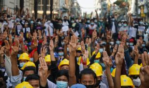 People gather in Myanmar to protest the February 1, 2021 military coup. (Image credit: Stringer/Anadolu Agency via Getty Images)