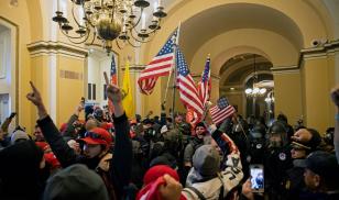 Supporters of outgoing president Donald Trump break into the US Capitol on January 6, 2021, in a bid to halt certification of the 2020 presidential election results. (Image credit: Brent Stirton/Getty Images)