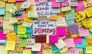 Messages left by protesters are displayed on the wall of the Hong Kong Government Complex in Admiralty, Hong Kong. Editorial Credit: Shutterstock.com. 