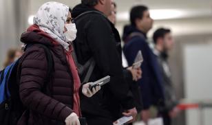 Travelers at the airport amid coronavirus pandemic 