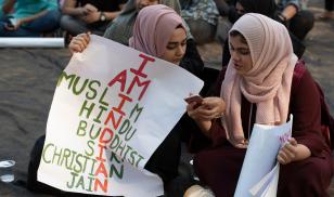 Two indian muslim women with poster protests against controversial anti-muslim Citizenship Amendment Bill (CAB CAA).  Mumbai, India. 19 December 2019. Editorial credit:  arun sambhu mishra / Shutterstock.com