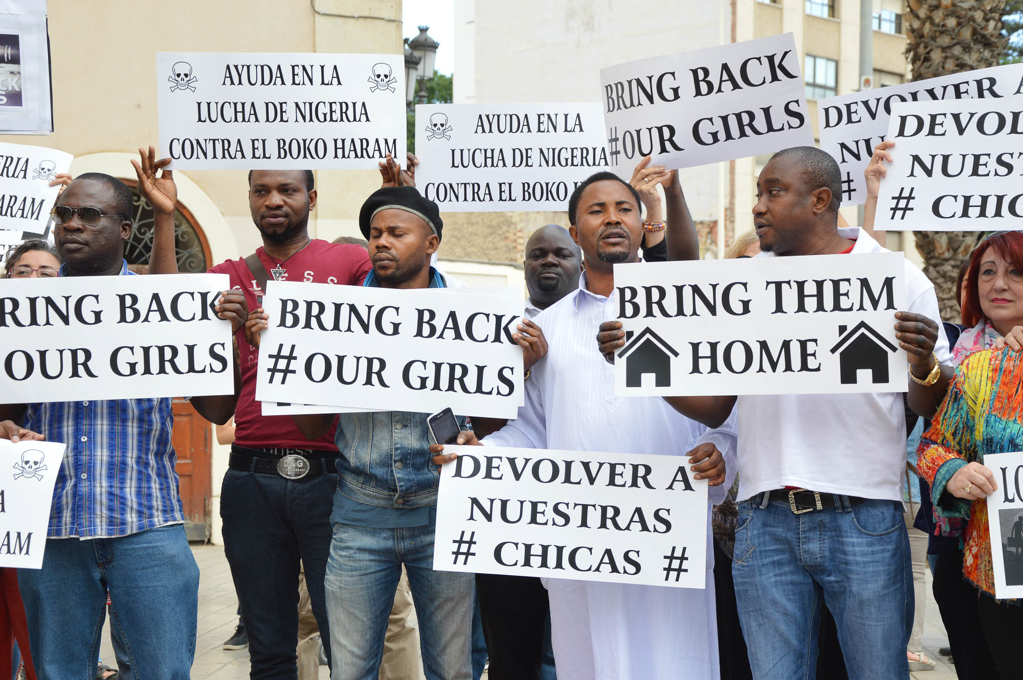 Association of Nigerians protest with locals against Boko Haram actions that claimed responsibility for abducting over 200 girls from a school in Chibok, Nigeria. Spain, 2014. Editorial credit: rSnapshotPhotos / Shutterstock.com.