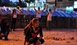 Protesters in front of police line