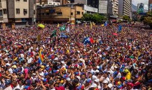Venezuelan opposition rallies in favor of the humanitarian aid to be delivered on the next few days at several border crossings.  Caracas, Venezuela. 12 February 2019. Editorial credit: Ruben Alfonzo / Shutterstock.com 